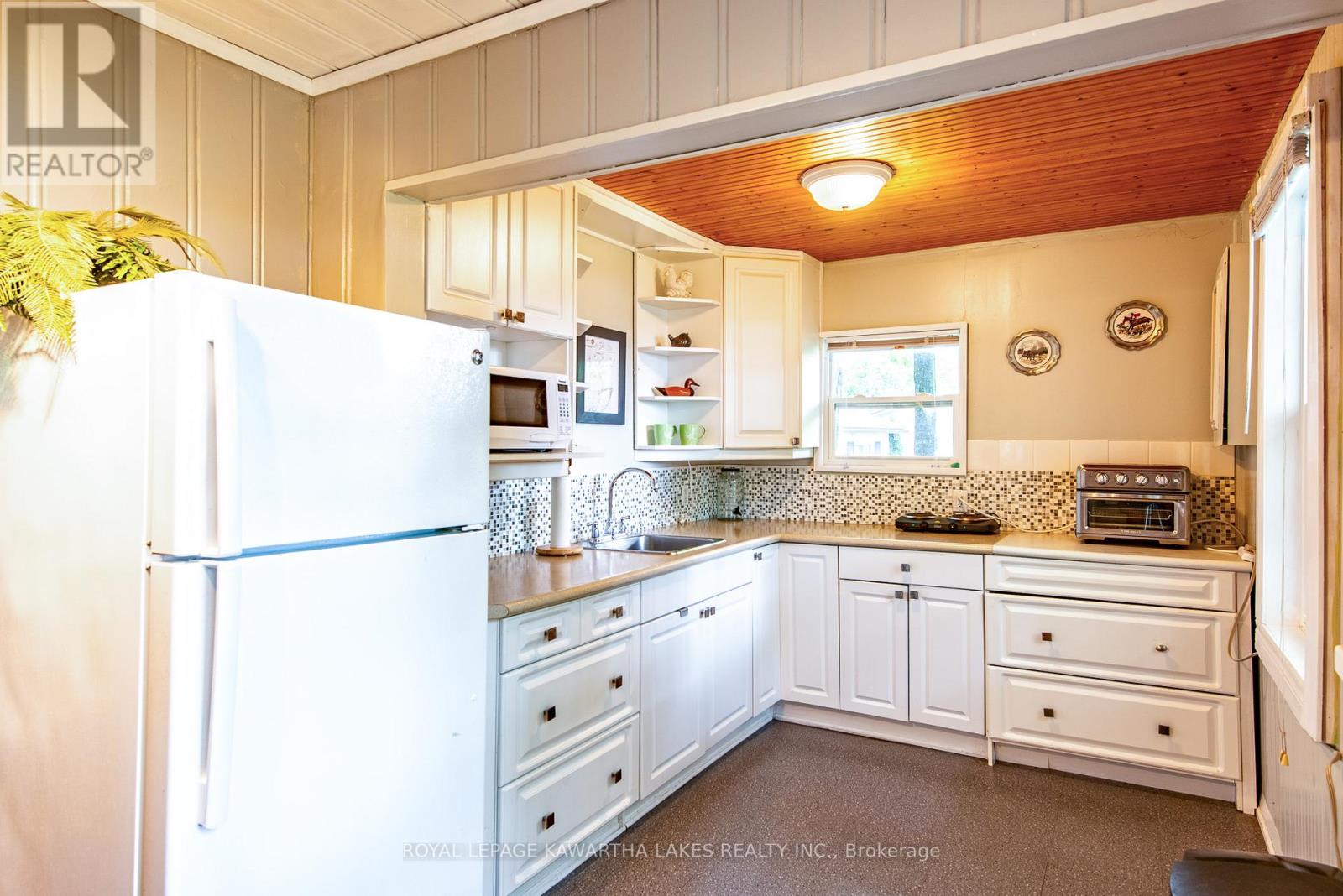 130 Driftwood Village Drive, Kawartha Lakes, Ontario  K0M 1K0 - Photo 5 - X12949198